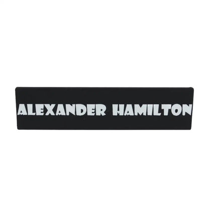 Black nameplate with white text.