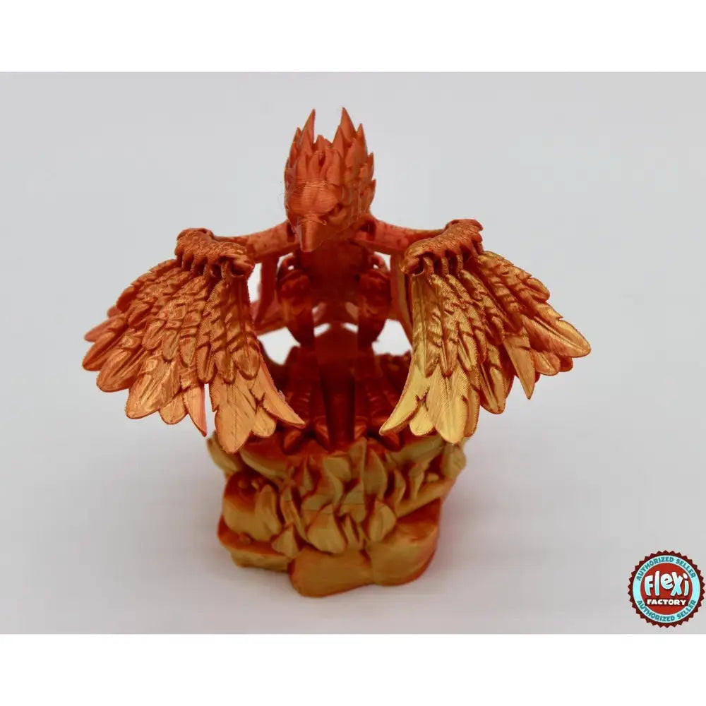 Orange phoenix figurine.