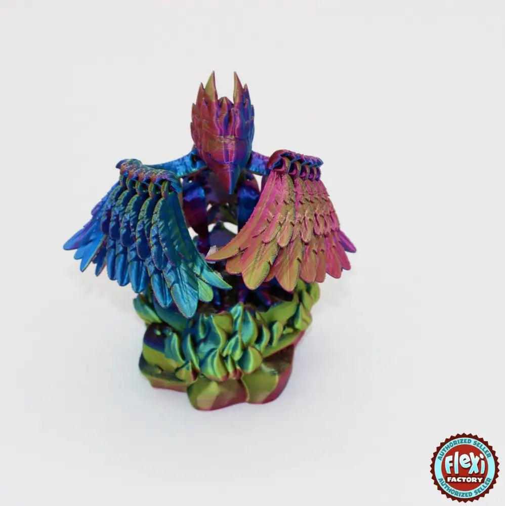 Iridescent, articulated, winged dragon figurine.