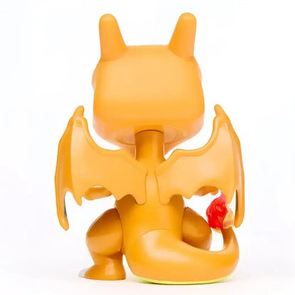 Orange plastic charizard funko pop vinyl figure with wings and red flame on tail collectible toy figure