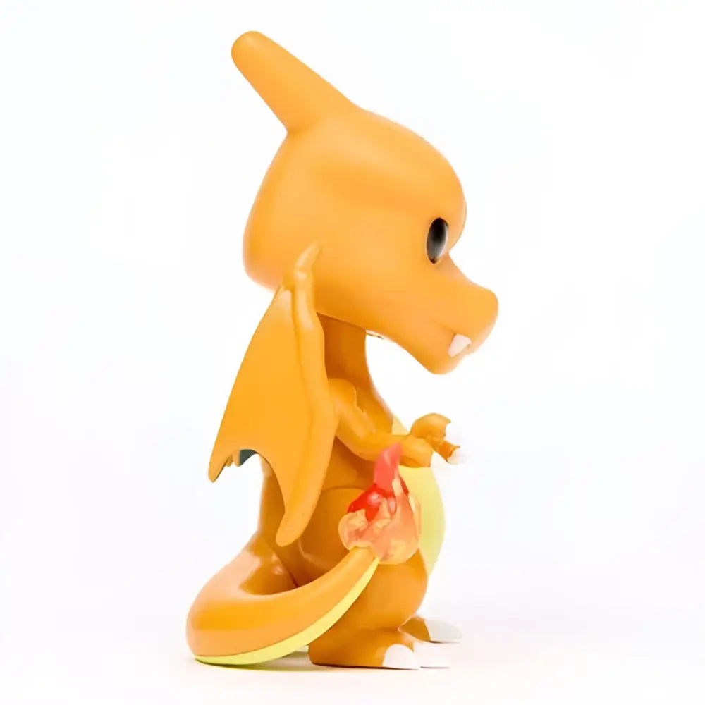 Orange plastic charizard funko pop vinyl figure with red flame on tail collectible toy number 843