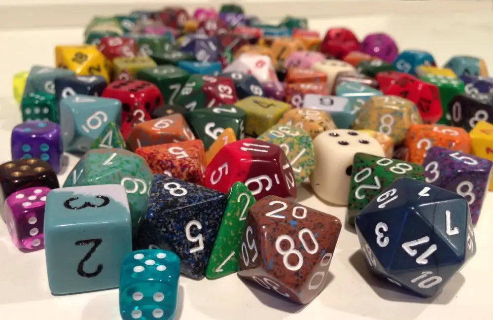 A diverse collection of multi-colored, multi-sided dice.