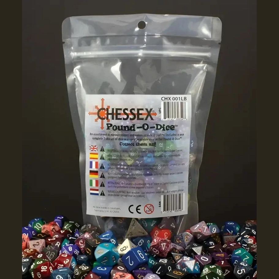 A clear plastic bag filled with assorted polyhedral dice, with many similar dice scattered around it.