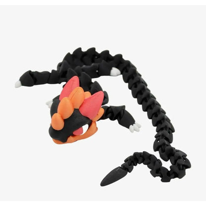 Articulated black dragon toy.