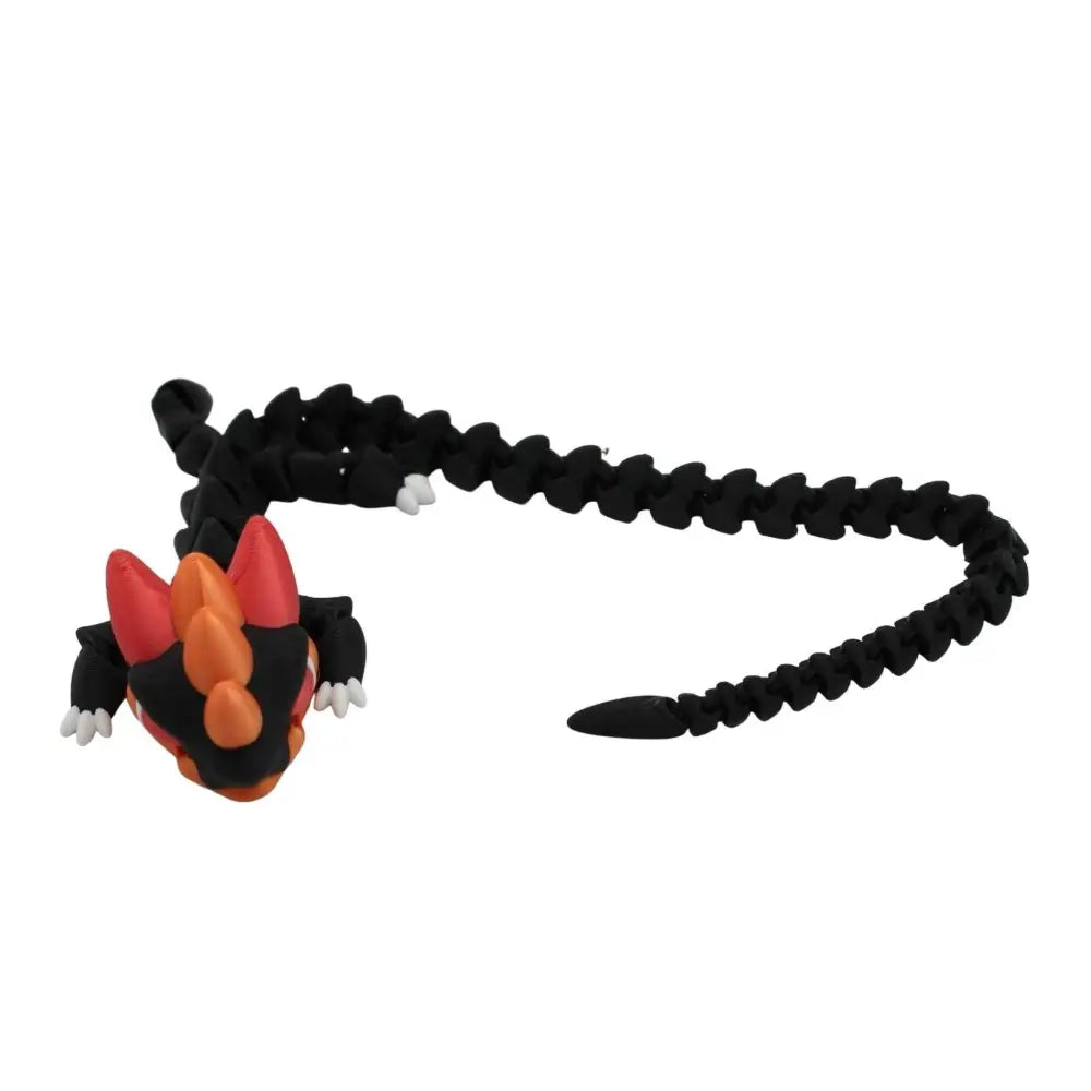 Black and orange dragon toy.