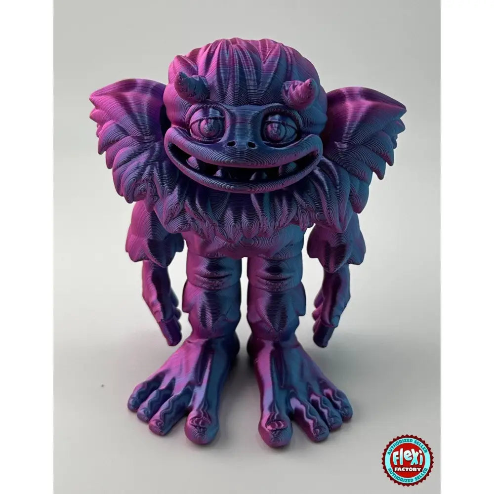 Purple and blue 3D printed monster figurine.
