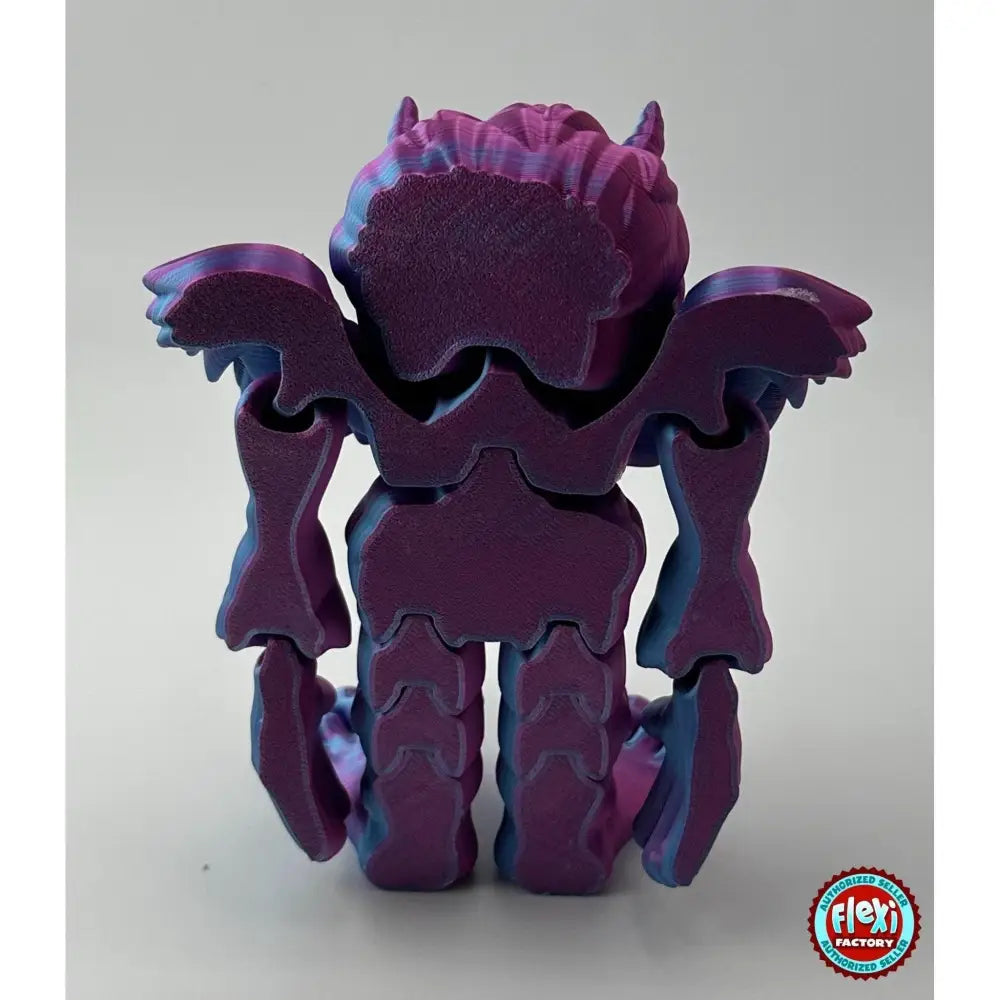 Purple and blue articulated monster figurine.