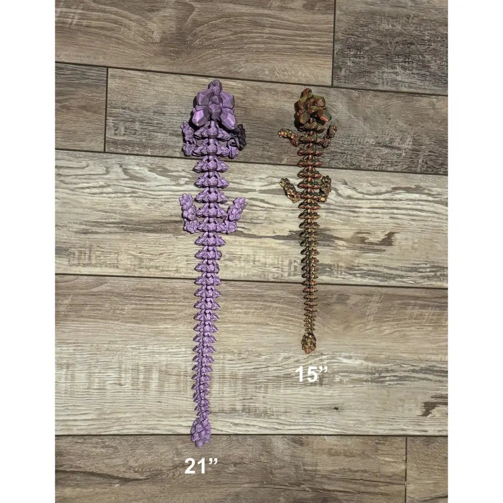Two articulated dragon tails.