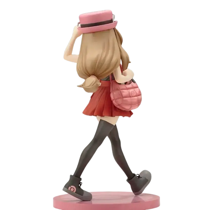 Serena with fennekin artfx j statue featuring an anime-style figurine wearing a pink quilted handbag and matching hat