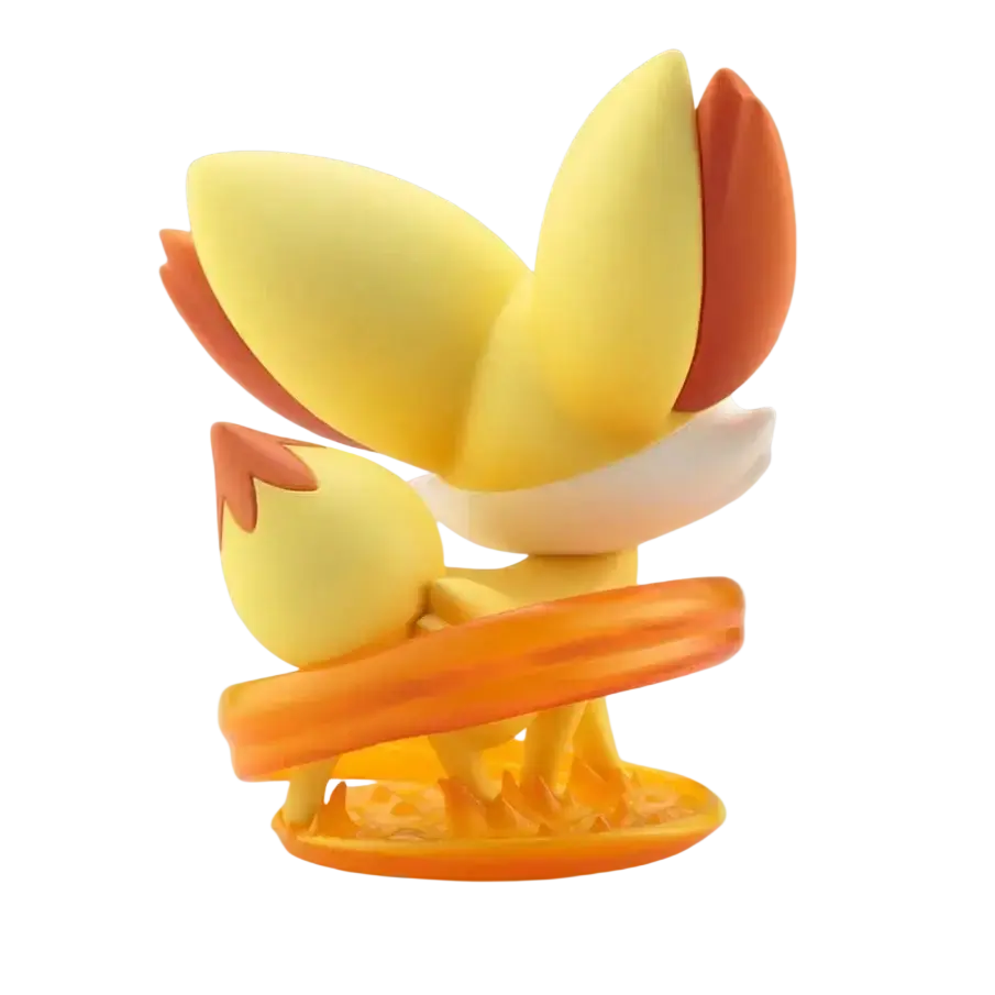 Serena fennekin artfx j statue featuring a yellow and orange figurine with flame-like tail tips on a matching base