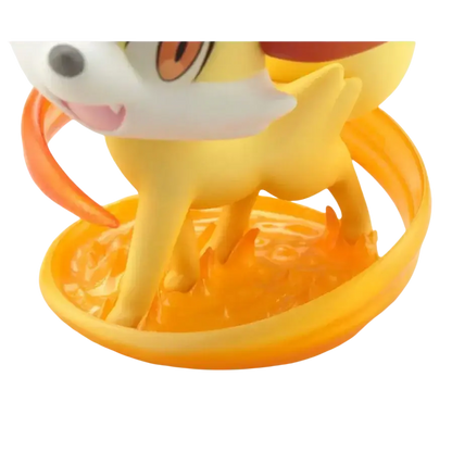Serena fennekin artfx j statue figurine featuring yellow and white colors with orange flame accents on a yellow base