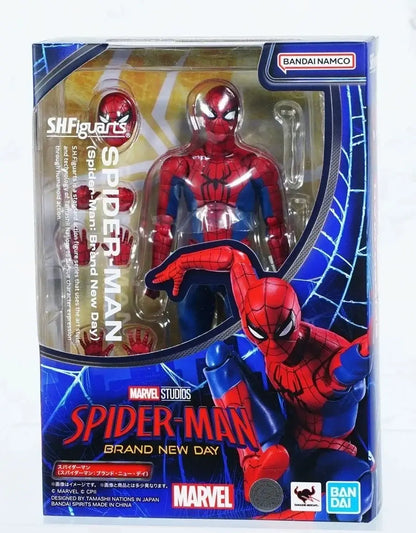 Spider-Man brand new day action figure in red and blue with interchangeable hands packaged in clear plastic for display