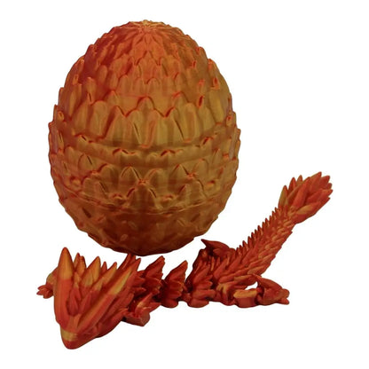 Orange dragon egg and articulated dragon.