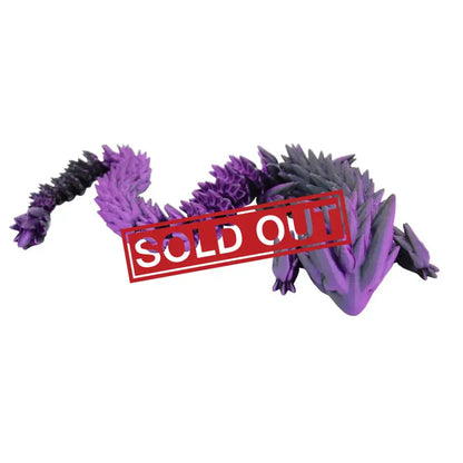 A flexible, articulated dragon toy in shades of purple and black.