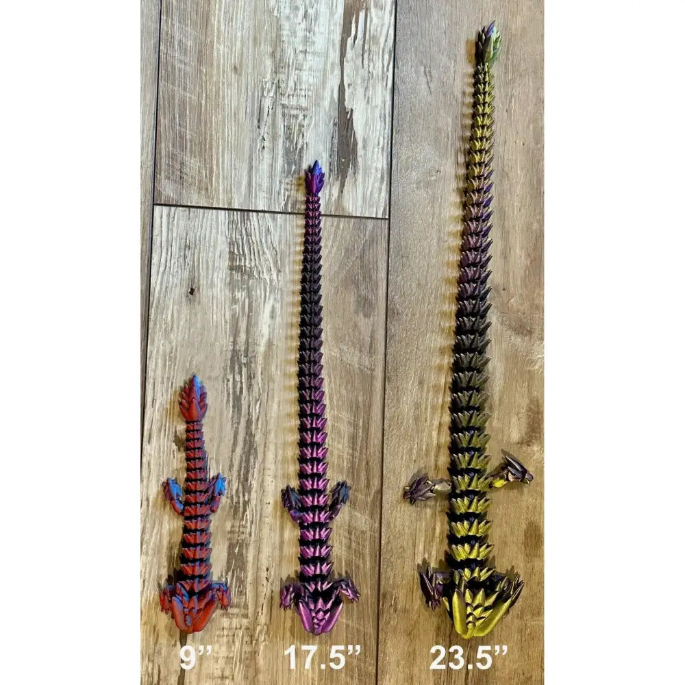 Three articulated 3D-printed lizards.