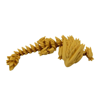Golden articulated dragon figurine.
