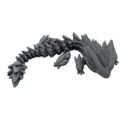 Gray, spiky dragon figurine.