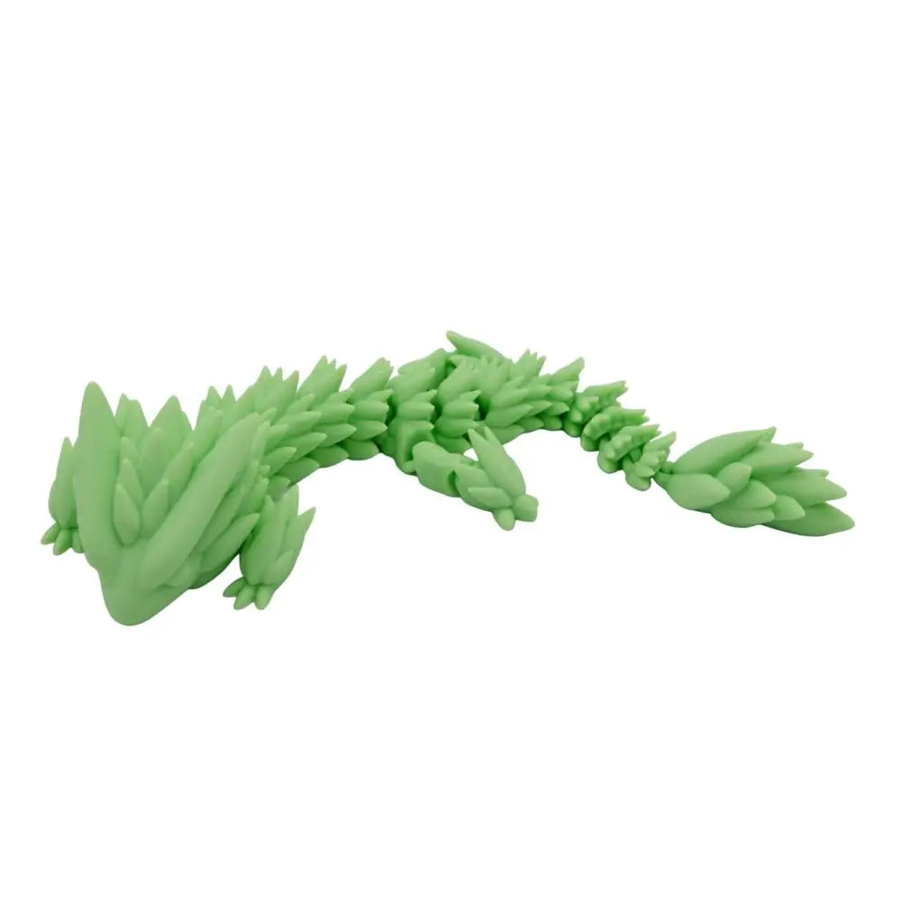 Green articulated dragon figurine.