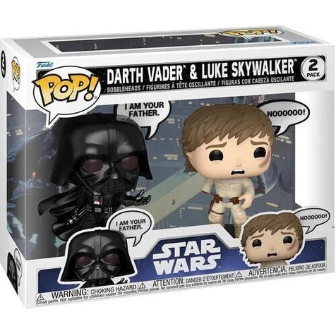 Black and white funko pop! Vinyl figures of darth vader and luke skywalker in their iconic star wars costumes.