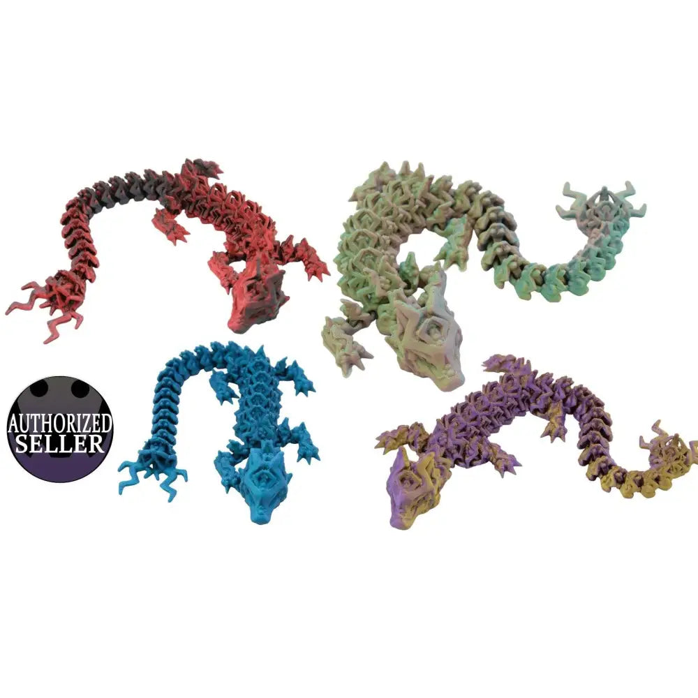 Four articulated dragon figurines.
