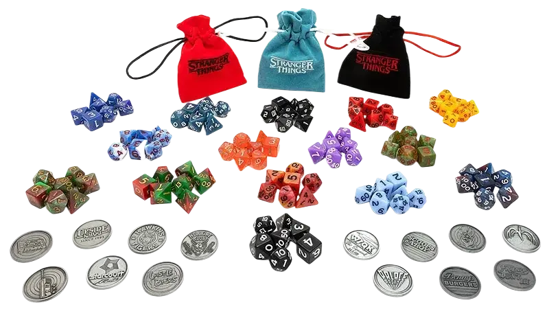A collection of colorful translucent polyhedral dice with black and white numbering in stranger things treasure packs