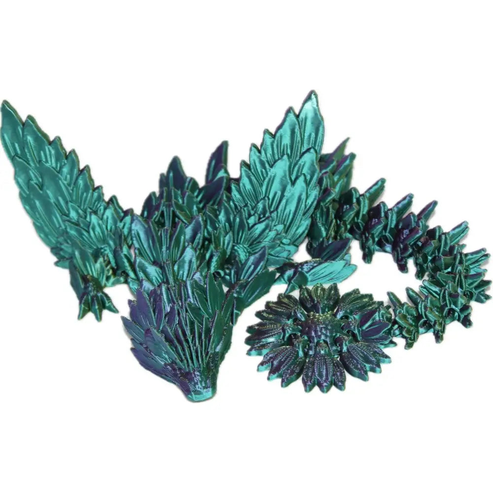 Iridescent teal crystal dragon figurine.