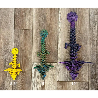 Three articulated dragon toys.