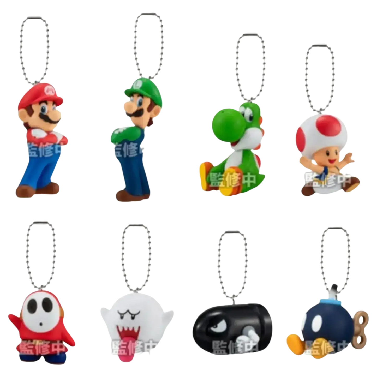 Set of eight colorful plastic keychains from the officially licensed bandai shokugan super mario bros mascot charm collection