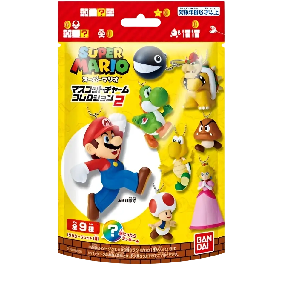 Yellow package of bandai shokugan super mario bros mascot charm collection blind bag vol 2 with mario and yoshi figurines