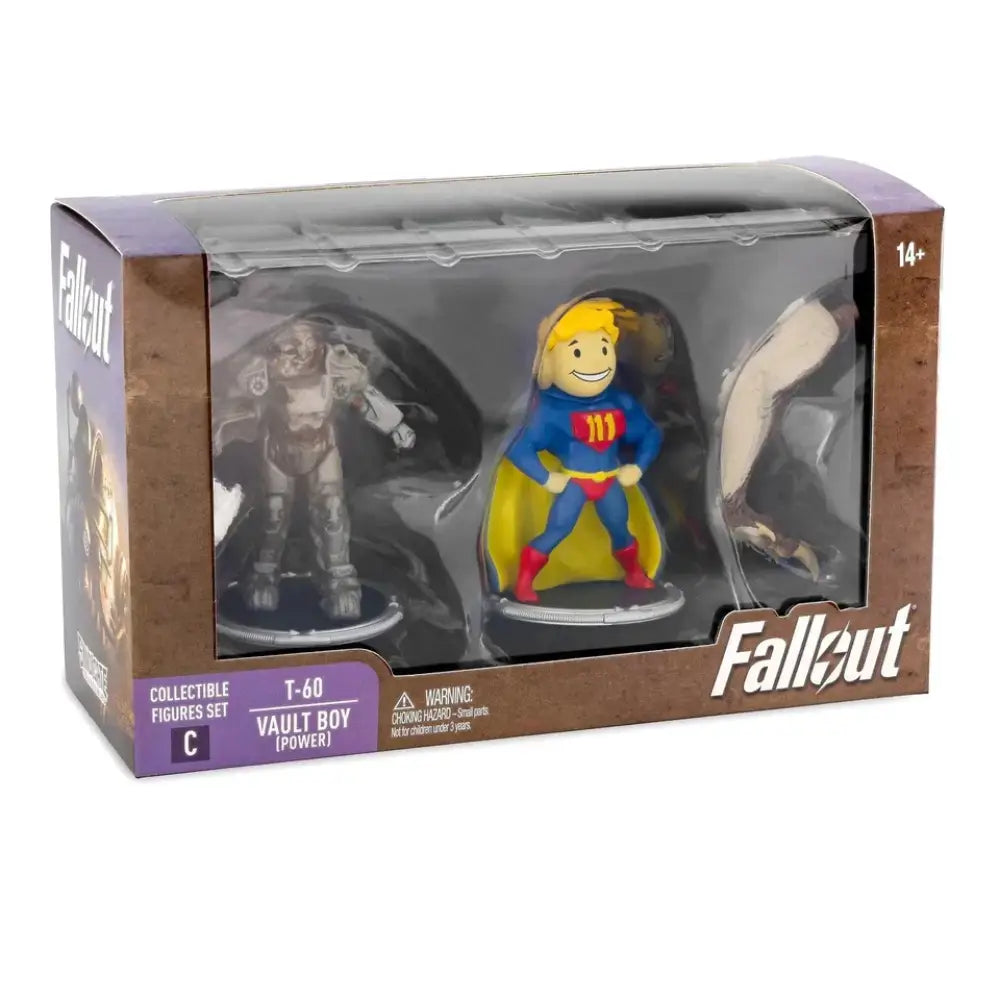 A boxed set of three Fallout collectible figures, including T-60 Power Armor and a Vault Boy in a superhero costume.