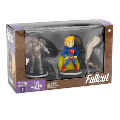 A boxed set of three Fallout collectible figures, including T-60 Power Armor and a Vault Boy in a superhero costume.
