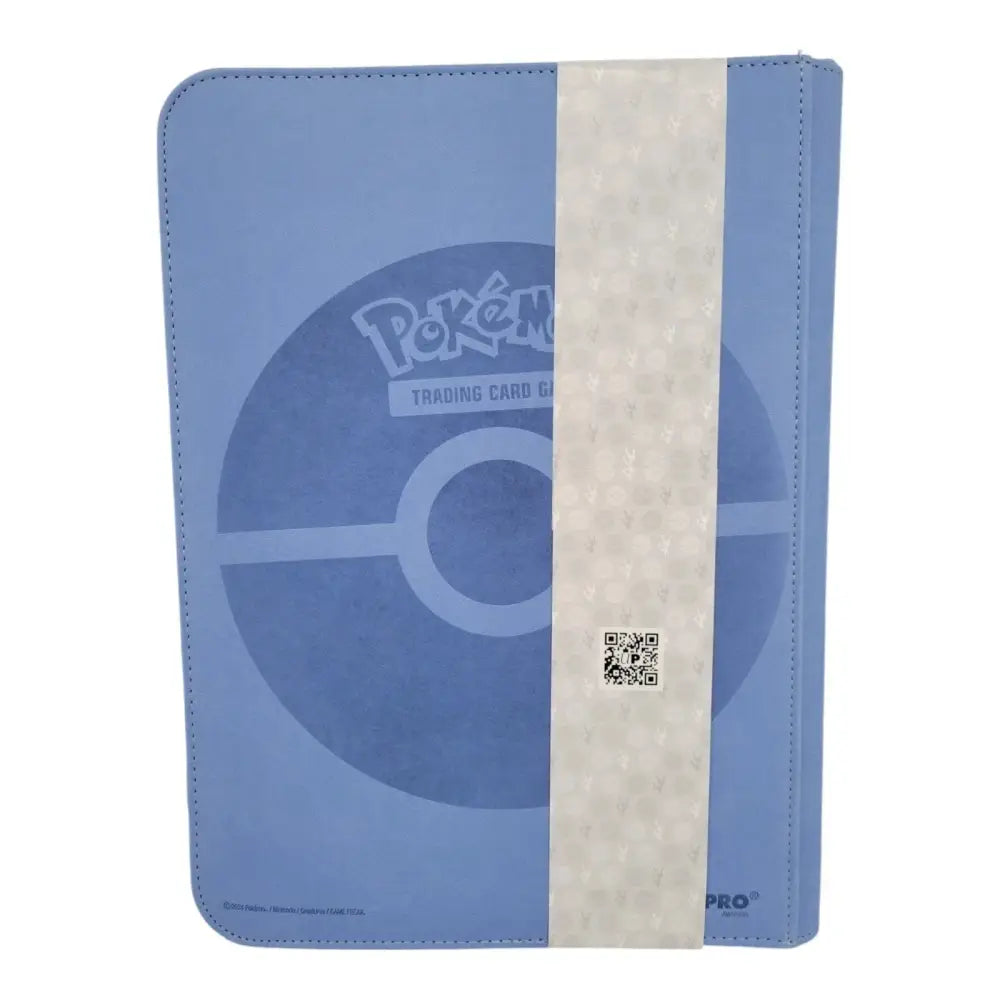 Blue pokémon trading card binder with a pokeball design and white strap.