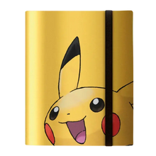 A yellow Pikachu-themed notebook or journal with a black elastic band closure.