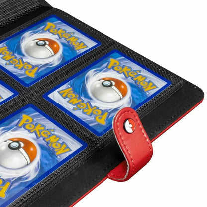 A black binder for storing Pokémon cards, with a red strap featuring a Poké Ball design.