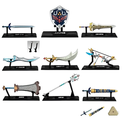 The zelda weapon collection blind box mini features detailed metallic and plastic replica weapons by bandai shokugan japan