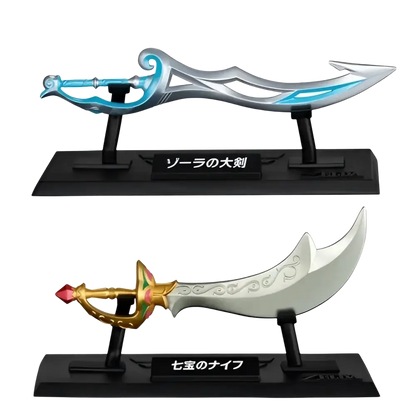 Silver and blue sword with ornate handle on black stand from bandai shokugan japan zelda weapon collection blind box mini