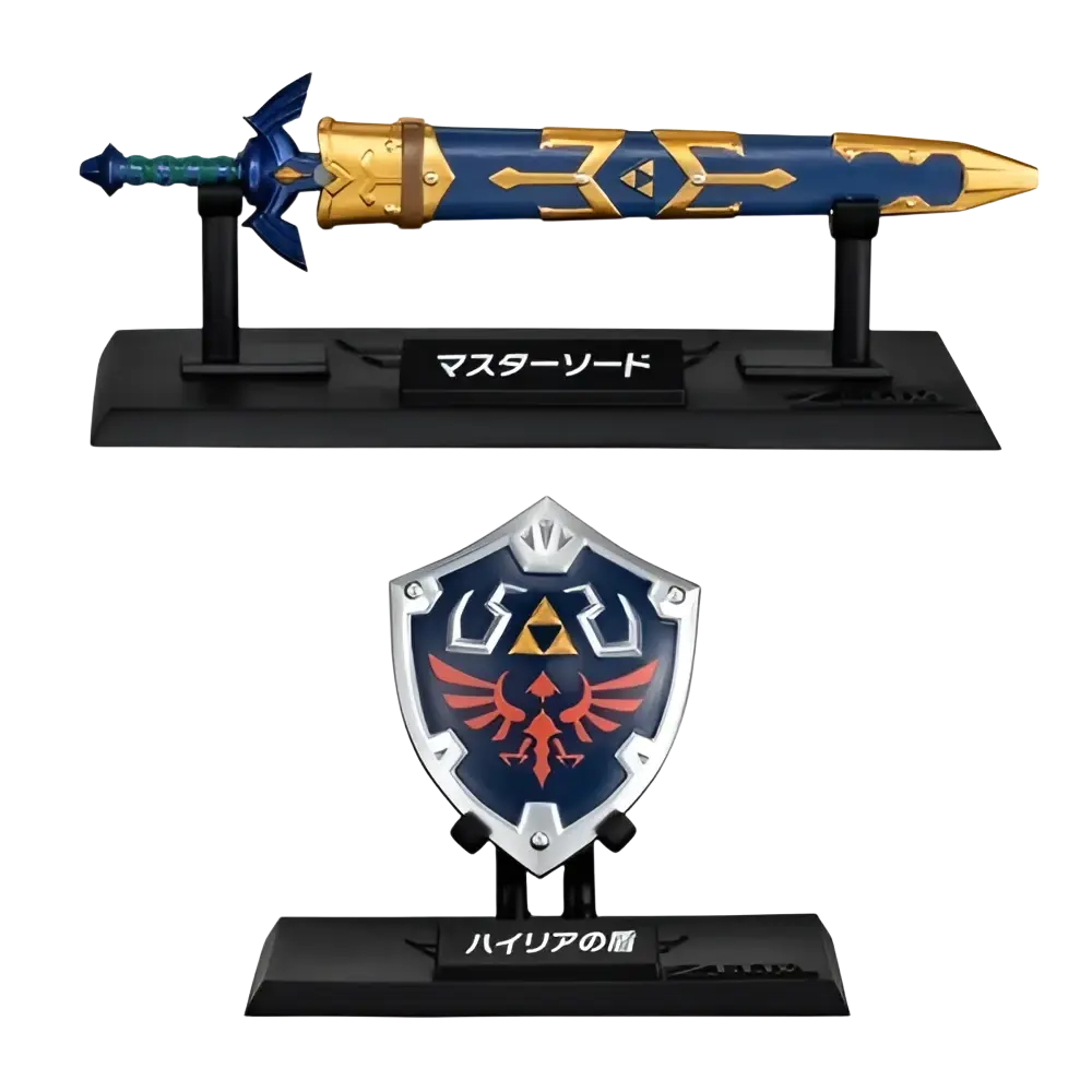Blue and gold master sword with golden trident patterns and silver-edged hylian shield from bandai shokugan japan zelda weapon collection blind box mini