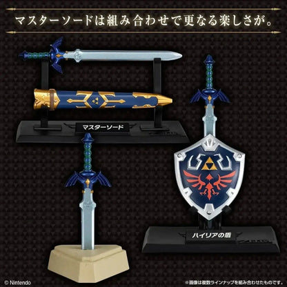 Blue and gold master sword figurine with a silver blade on beige stand from bandai shokugan japan zelda weapon collection blind box mini