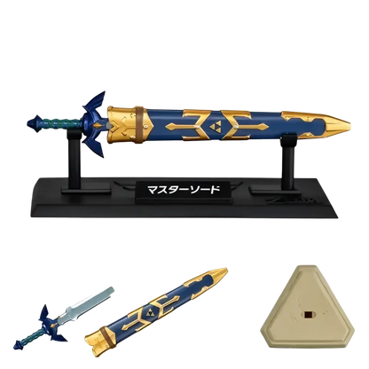 Blue and gold master sword figurine with intricate golden patterns on blade displayed on black stand from bandai shokugan japan zelda weapon collection blind box mini